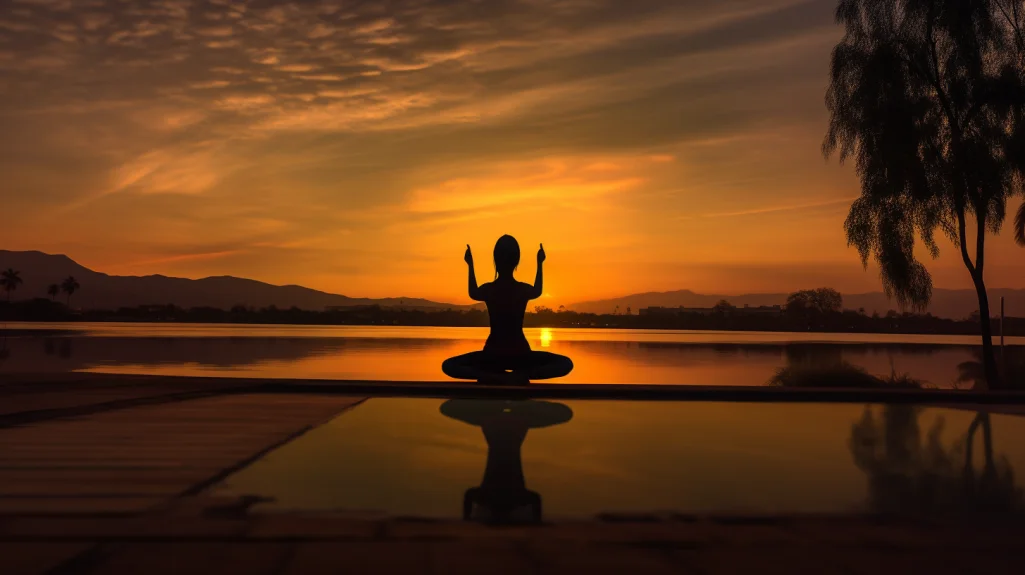pratiquante de yoga sereine devant coucher de soleil